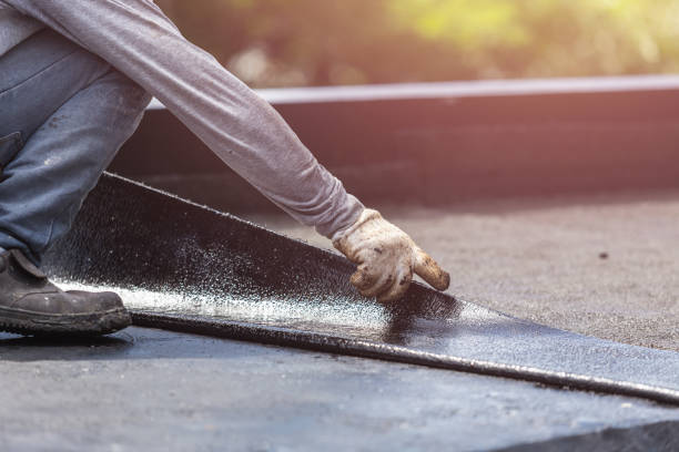 Professional Basement Waterproofing technician working in Rock Island, TN